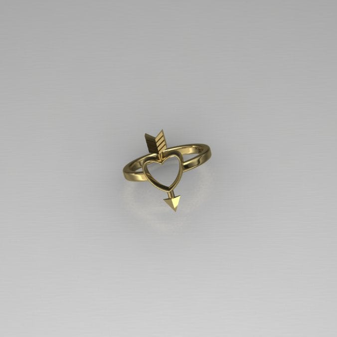 Heart and arrow ring in 10 karat yellow gold